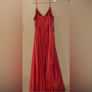 Worn Once, No Stains, Slight Rip.